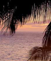 Sunset with long boat